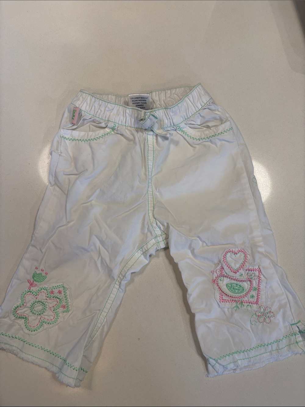 White Baby Embroidered Pants with Pink & Green Embroidered Accents